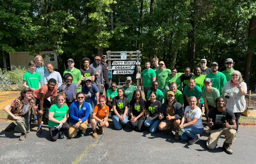 Volunteers and community partners gathered for a group photo.